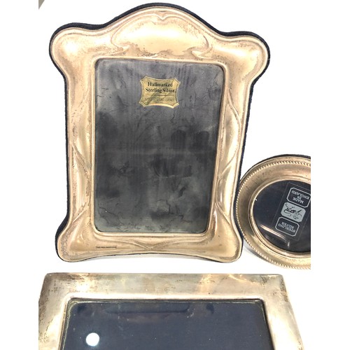 26 - 3 silver picture frames largest measures approx 23 by 17cm missing back stand