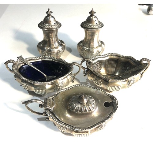75B - Antique silver cruet set missing liners mustard pot bun feet are damaged weight 220