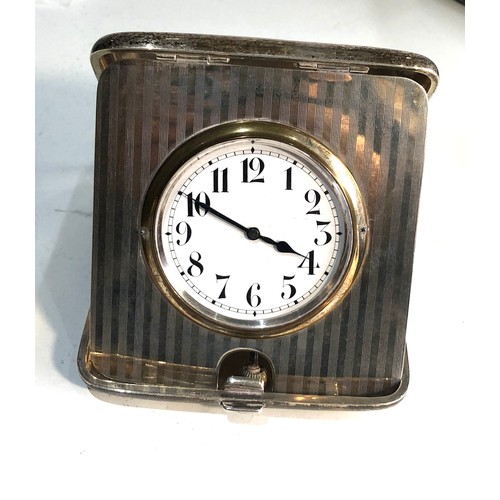 11 - Antique silver case travel clock clock not working winder pulls our engine turned case in good condi... 