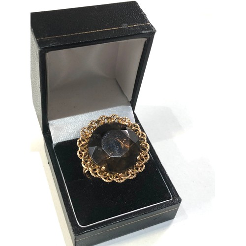 378 - 18ct gold ornate smoky quartz cocktail ring weight 12.5g