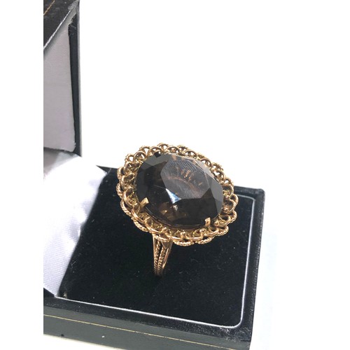 378 - 18ct gold ornate smoky quartz cocktail ring weight 12.5g