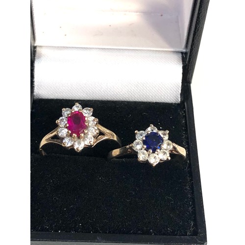 385 - 2 x 9ct gold halo set rings weight 3.6g