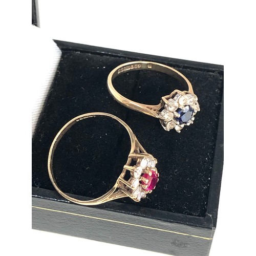 385 - 2 x 9ct gold halo set rings weight 3.6g