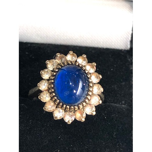 374 - 9ct gold blue stone cabochon set cocktail ring weight 3.8g