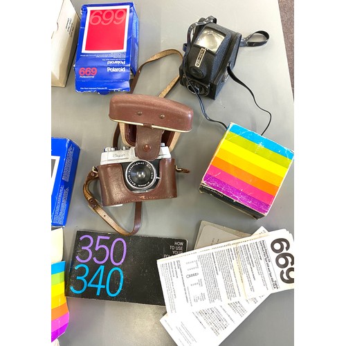 35 - Selection of cameras and cameras equipment to include polaroid 340 and a super halina vintage camera... 