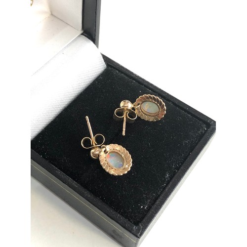 257 - 14ct gold opal earrings weight 1.4g