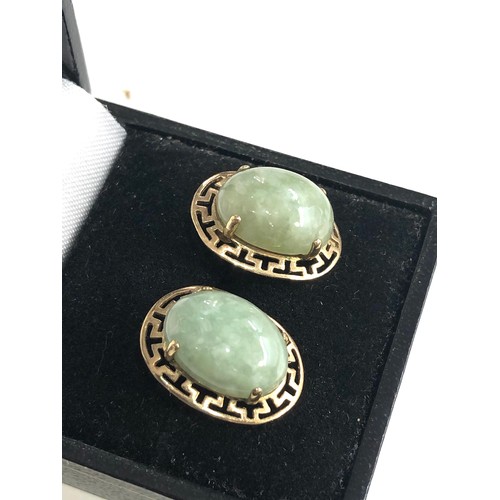 223 - 9ct gold jade earrings measures approx 1.9cm by 1.4cm weight 4.6g