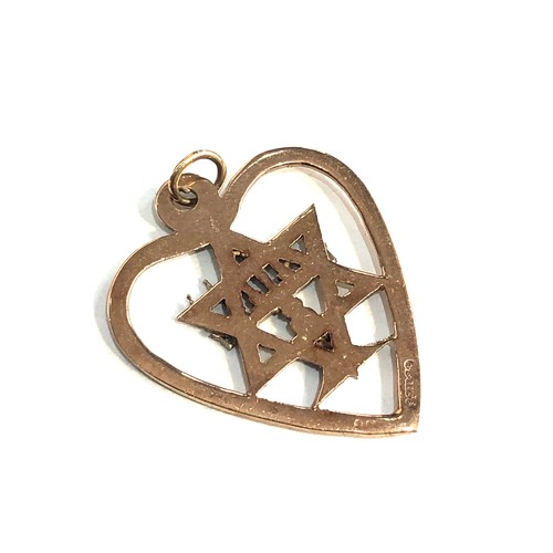 197 - 9ct gold star of david jewish pendant measures approx 2.7cm by 2.2cm weight 2g