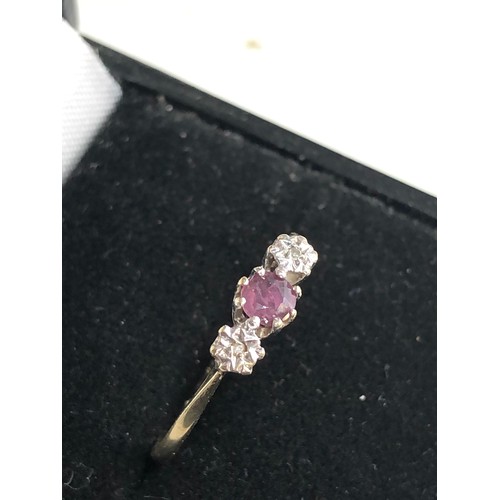 221 - 9ct gold diamond and  ruby ring weight 1.3g