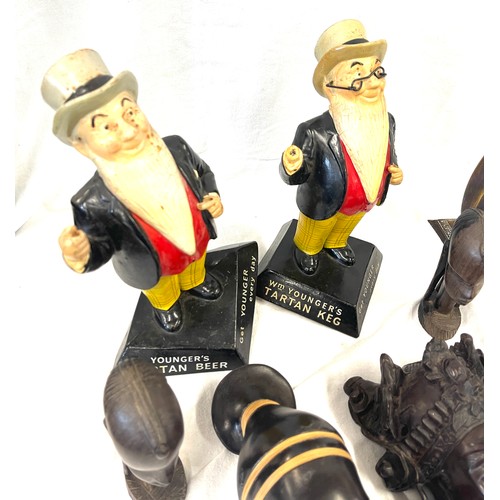 54 - Selection of carved african figures, 2 Tartan bar man figurines, beswick sheep etc