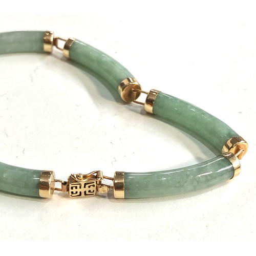 213 - 14ct gold chinese jade bracelet weight 12g