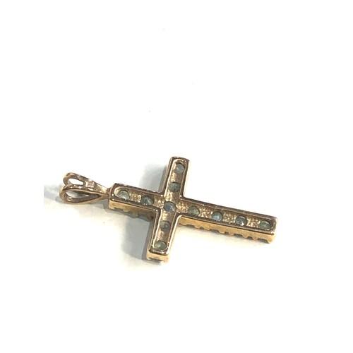 175 - 9ct gold gemstone set cross pendant weight 1.5g