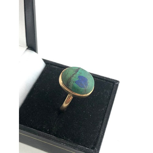 187 - 18ct gold turquoise cabochon ring weight 5.8g