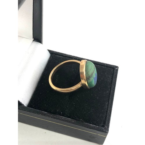 187 - 18ct gold turquoise cabochon ring weight 5.8g