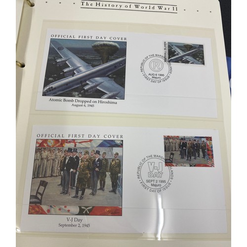 8 - 2 Albums containing Westminister mint the history of WW2 first day covers and coin sets include £2 a... 
