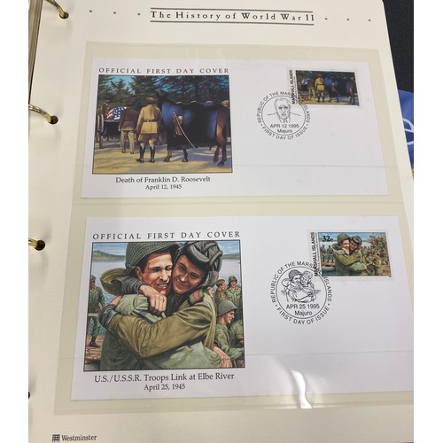 8 - 2 Albums containing Westminister mint the history of WW2 first day covers and coin sets include £2 a... 