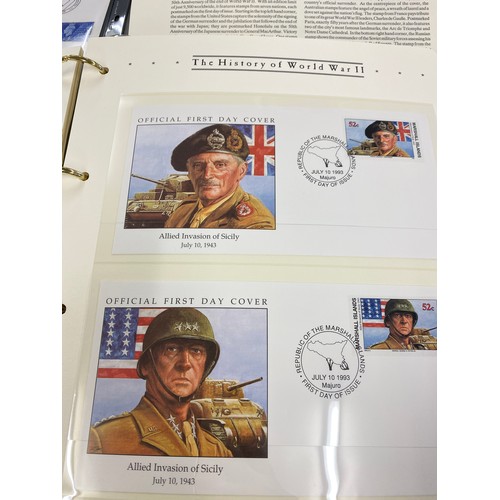 8 - 2 Albums containing Westminister mint the history of WW2 first day covers and coin sets include £2 a... 