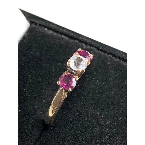 209 - 9ct gold stone set & ruby ring weight 2g