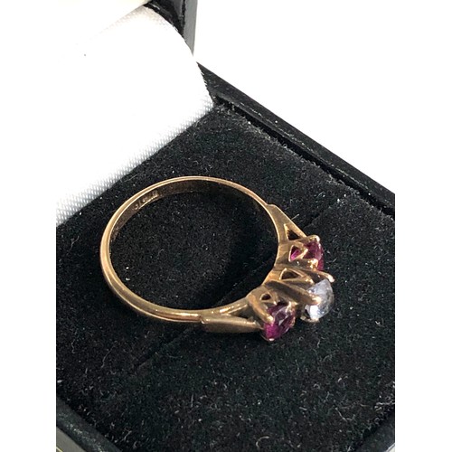 209 - 9ct gold stone set & ruby ring weight 2g