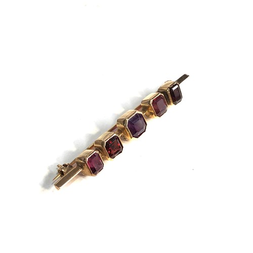 178 - 9ct gold garnet brooch weight 5.5g