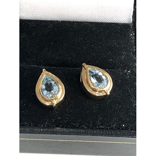 144 - 2 x gold aquamarine slider pendants weight 2.8g