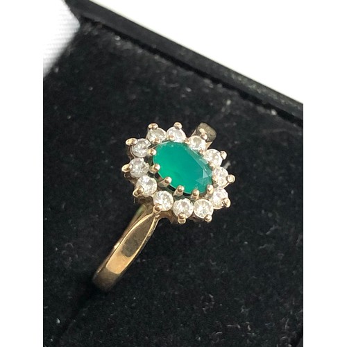 239 - 9ct gold stone set halo ring weight 1.8g