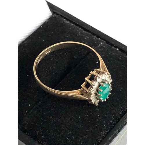 239 - 9ct gold stone set halo ring weight 1.8g