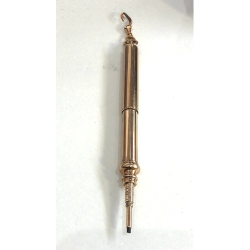 163 - 9ct gold retractable pencil w/ dog clip weight 13.2g