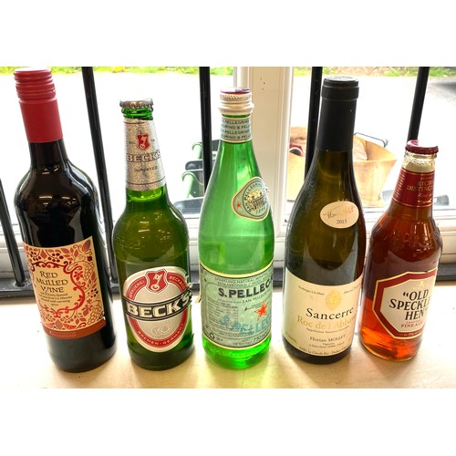 19 - Selection of assorted alcohol includes, Red mulled wine, becks, old speckled hen etc