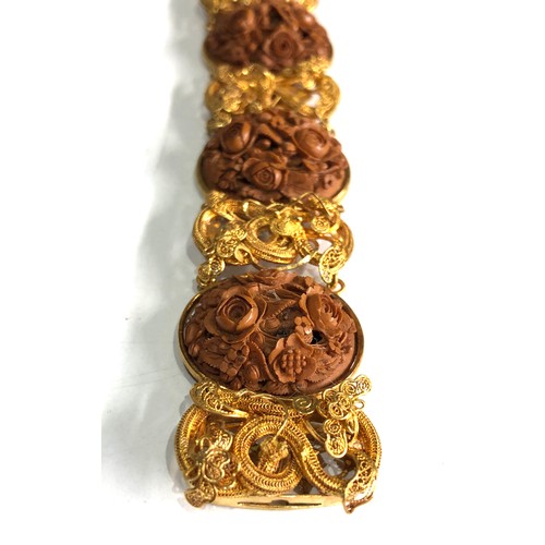 194 - Antique 18ct gold chinese hand carved walnut panel bracelet with filigree snake design, needs repair... 