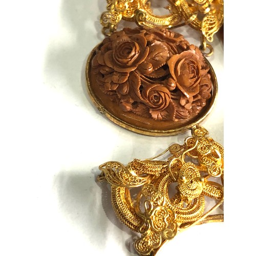 194 - Antique 18ct gold chinese hand carved walnut panel bracelet with filigree snake design, needs repair... 