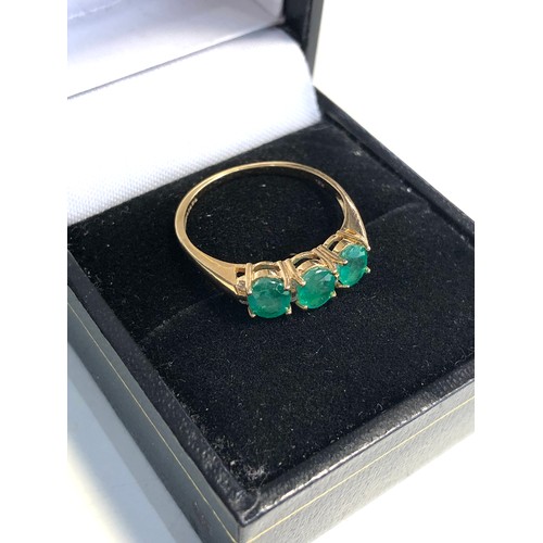 294 - 18ct gold emerald & diamond accent trilogy ring by lliana wight 2.3g