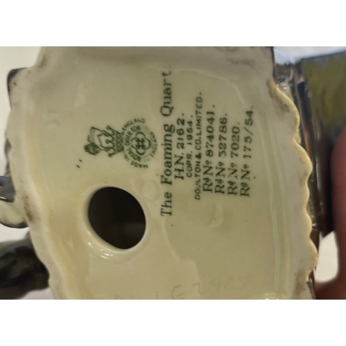 93 - Royal Doulton figures, The Wayfarer HN 2362, The foaming quart HN2162, both in good overall conditio... 