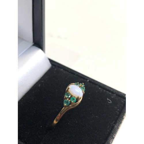 295 - 9ct opal & emerald shouldered ring 1.5g