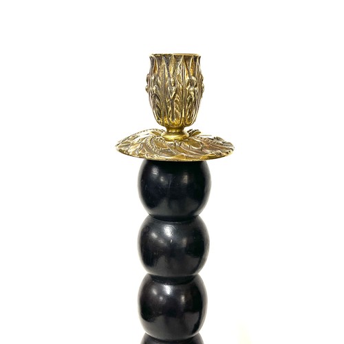 76 - Pair brass top and wooden candlesticks, approximate height: 15 inches