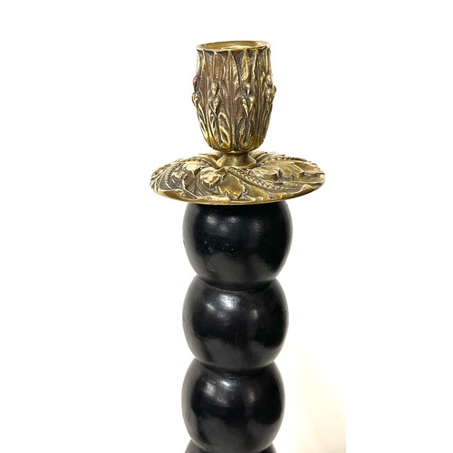 76 - Pair brass top and wooden candlesticks, approximate height: 15 inches