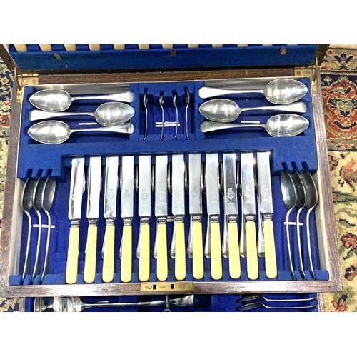 1 - Impressive vintage canteen of cutlery with ivorine handles in oak case 
Knives - 24 
Forks- 24 
Tabl... 