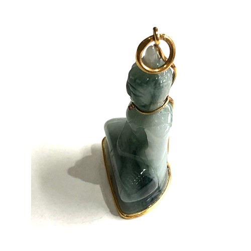 253 - 9ct carved jade buddha pendant 9.5g