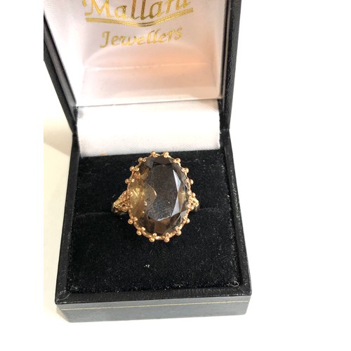 166 - 9ct ornate smoky quartz cocktail ring 6.7g