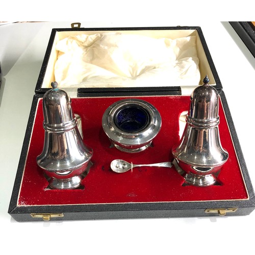 23 - Boxed silver cruet set