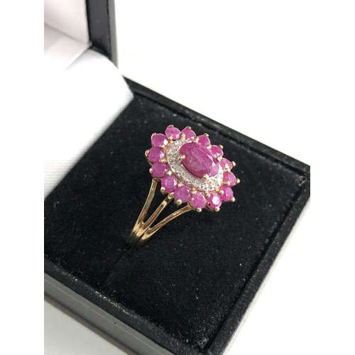 54 - 9ct gold diamond and ruby ring weight 4g