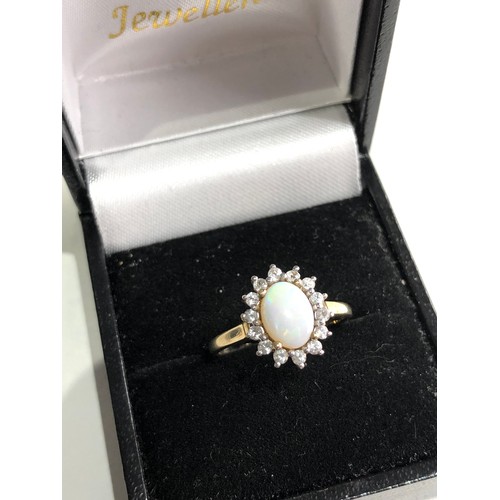 69 - 9ct gold opal ring weight 1.9g