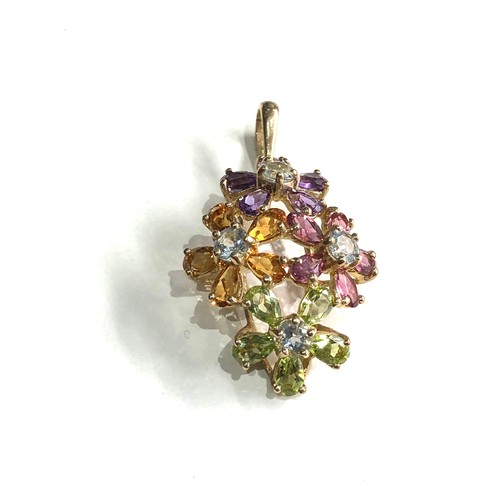 73 - Large 9ct gold gem set pendant measures approx 3.9cm drop by 2.2cm wide weight .6g