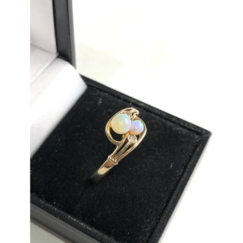 75 - 14ct gold opal ring 2.7g