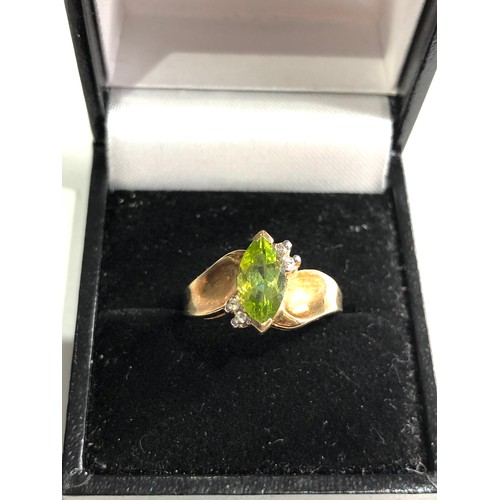 78 - 9ct gold diamond and peridot ring weight 2.9g