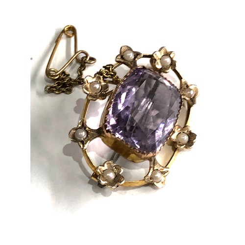 85 - Antique  amethyst and seed-pearl brooch measures approx 3.2cm by 2.4cm