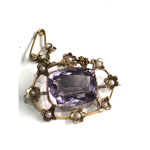 85 - Antique  amethyst and seed-pearl brooch measures approx 3.2cm by 2.4cm