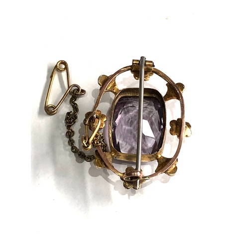 85 - Antique  amethyst and seed-pearl brooch measures approx 3.2cm by 2.4cm