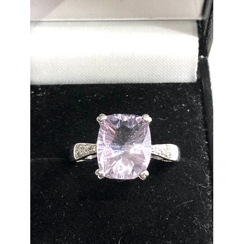 86 - 9ct gold diamond and amethyst ring weight 4.1g