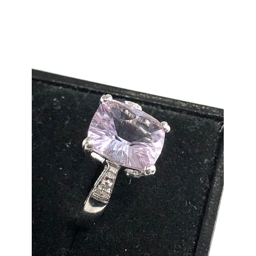 86 - 9ct gold diamond and amethyst ring weight 4.1g